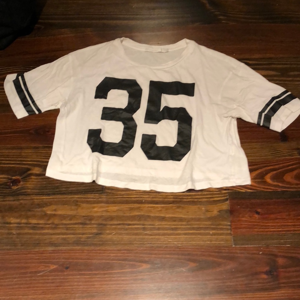 Sports style graphic tee.
